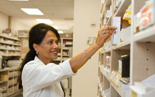 prescriptions being picked up by the pharmacist